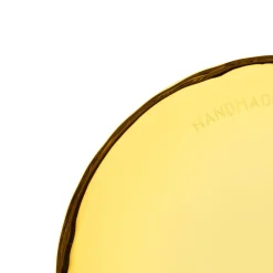 Glasunderlägg 9cm eldgul